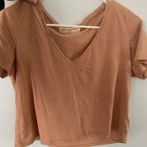 Urban Outfitters cropped V-neck lace trimmed tee